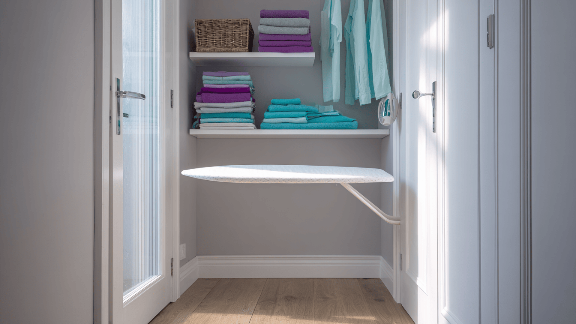 wall mounted foldable ironing station for studio apartment storage ideas