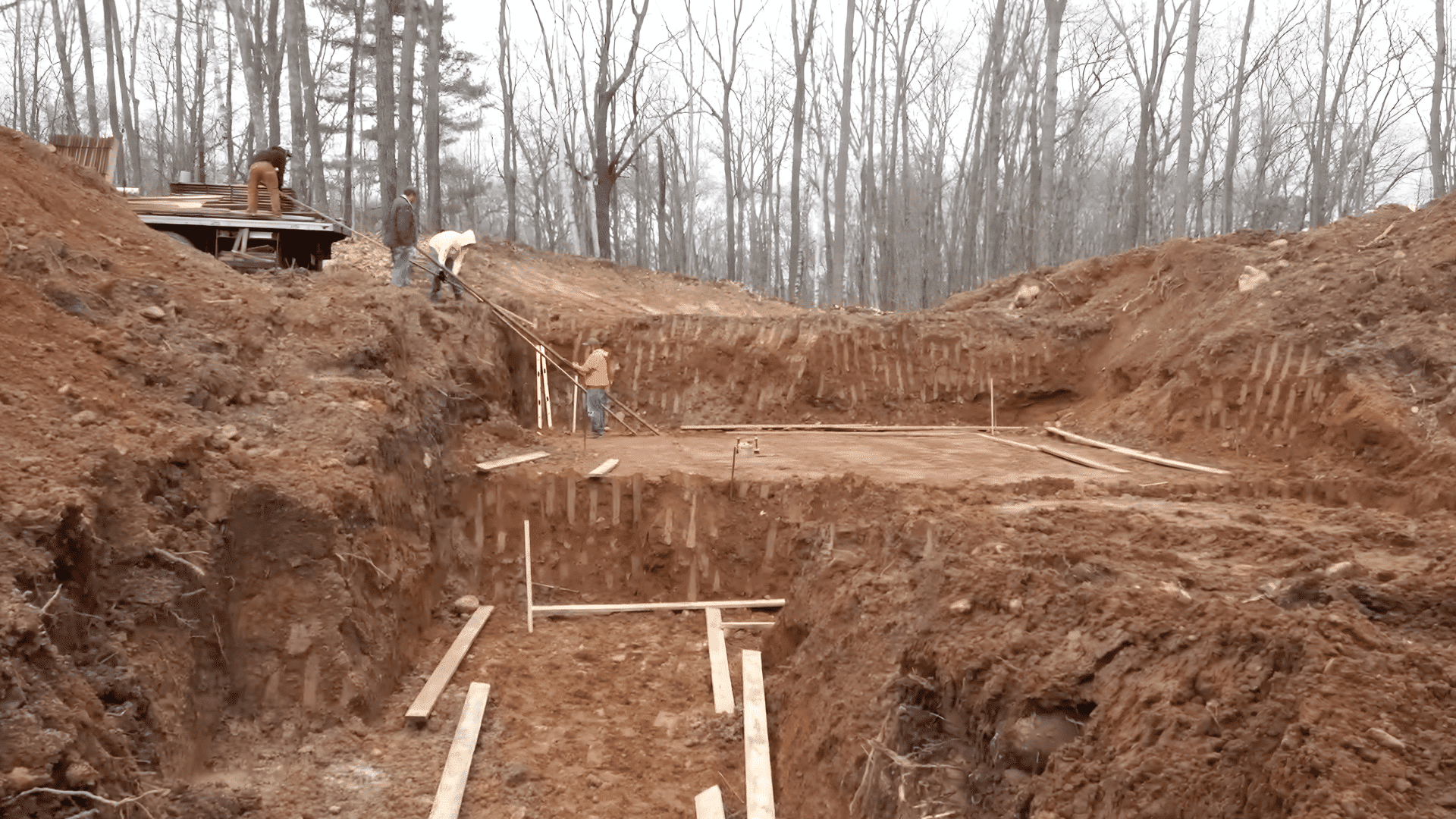excavate and level the site