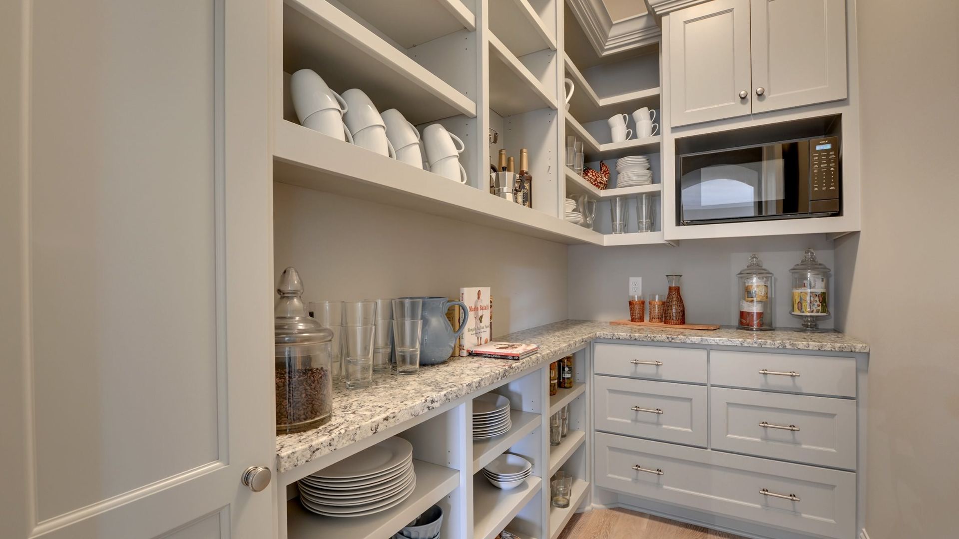 l shaped kitchen with hidden pantry