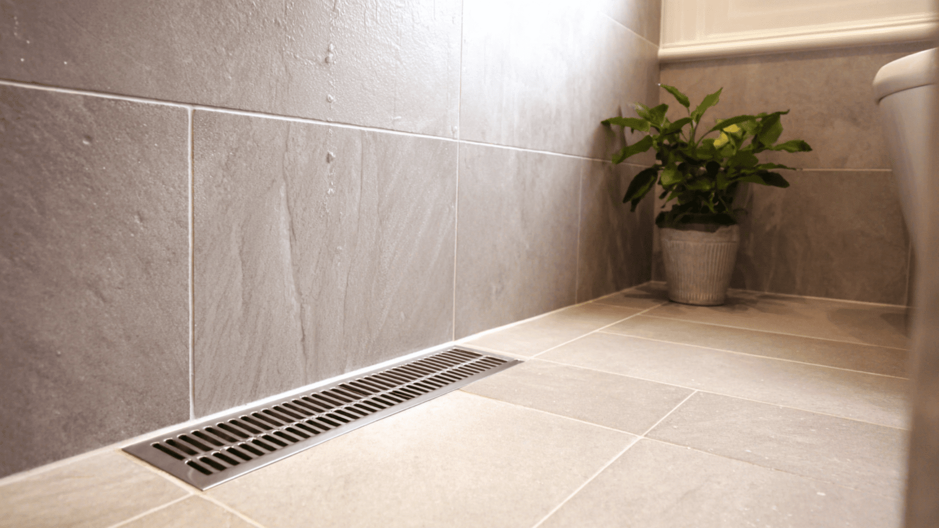 linear drain along the wall