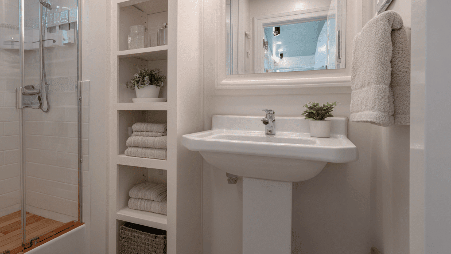 pedestal sink with storage nearby