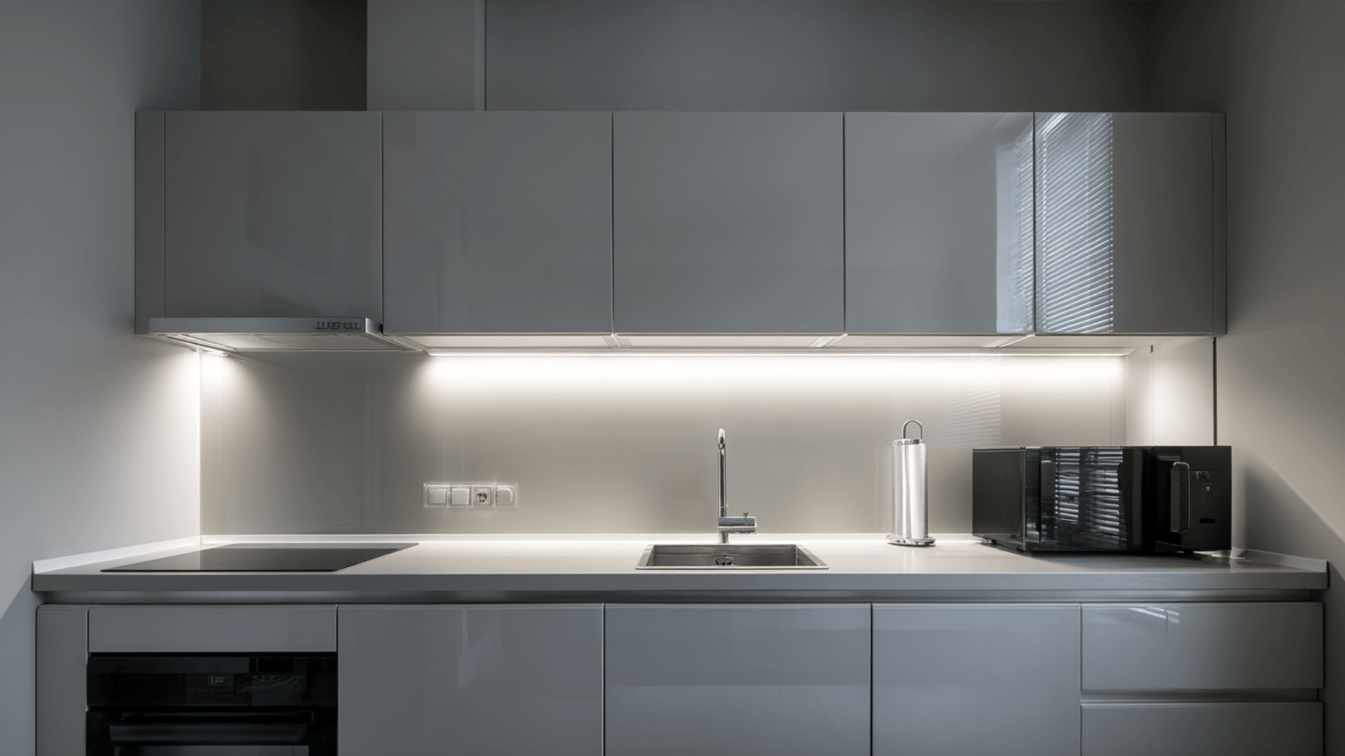 reflective glossy cabinets in a small space