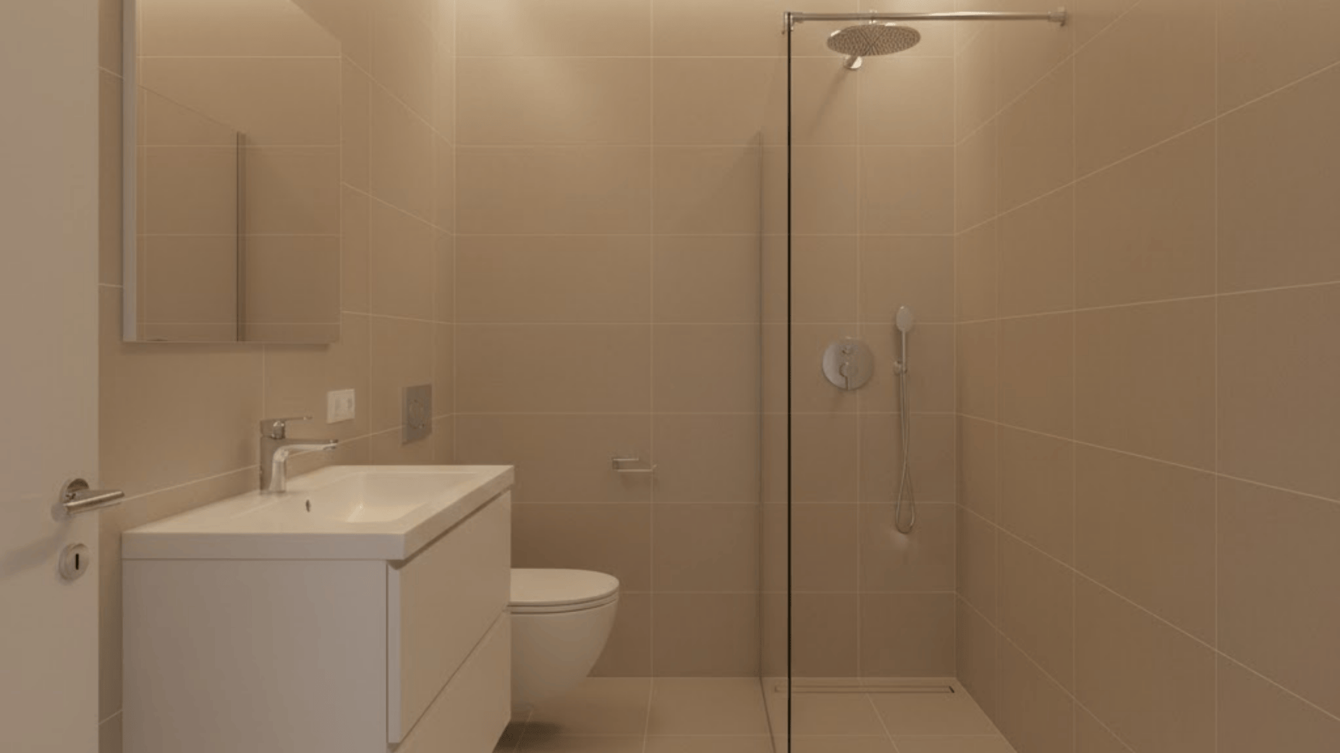 shower at the far end toilet and vanity together