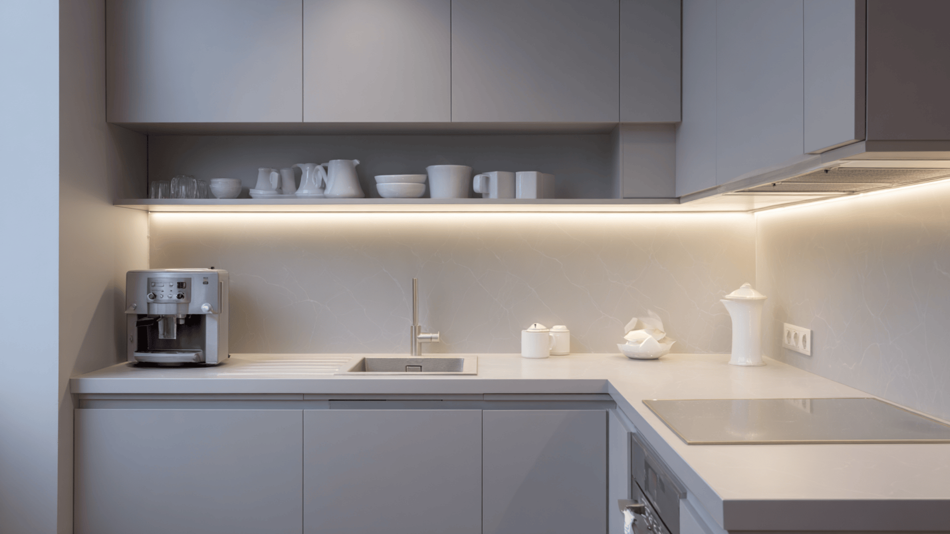 soft gray cabinets with a matching backsplash