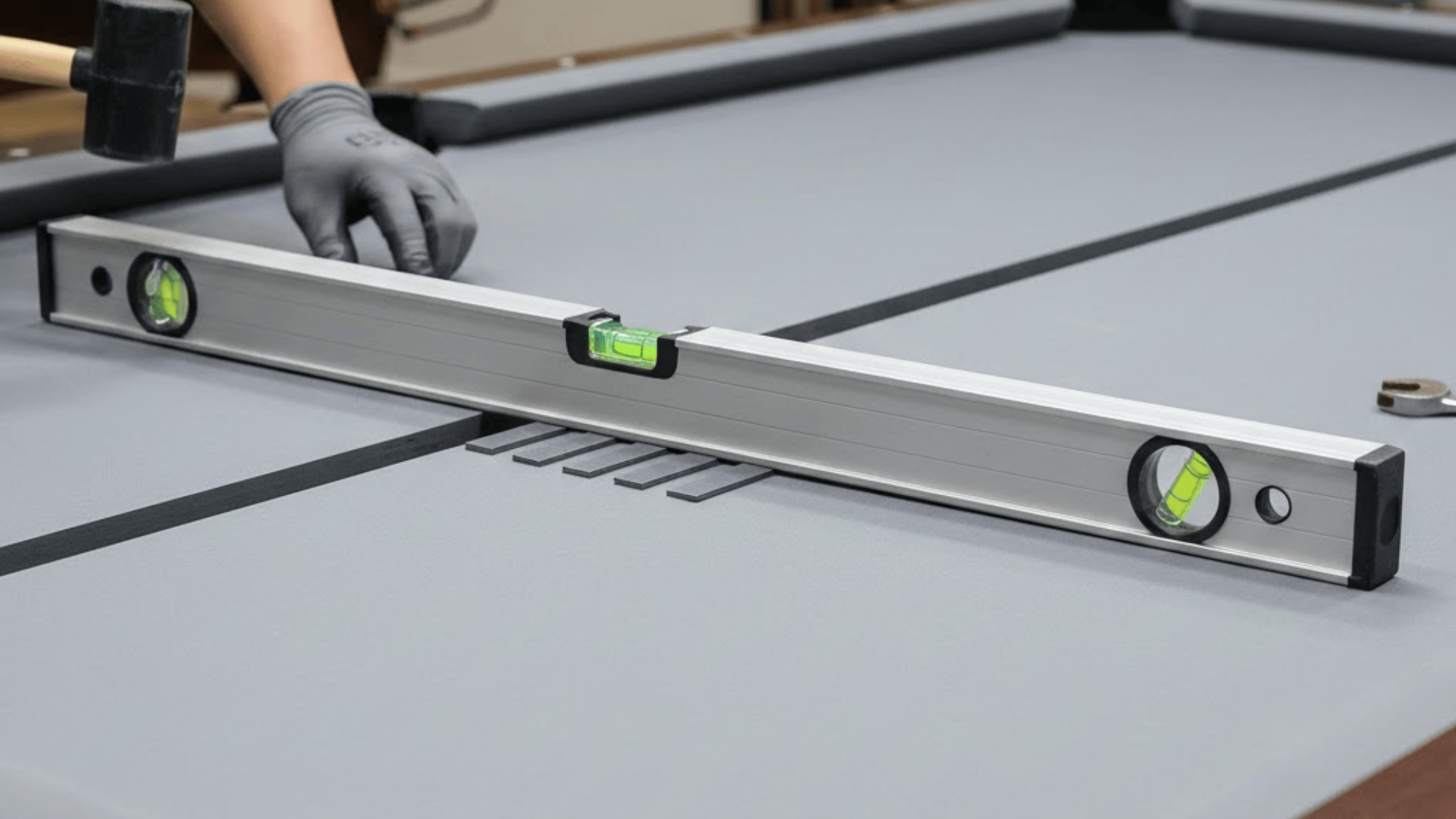 re assembling and leveling the pool table