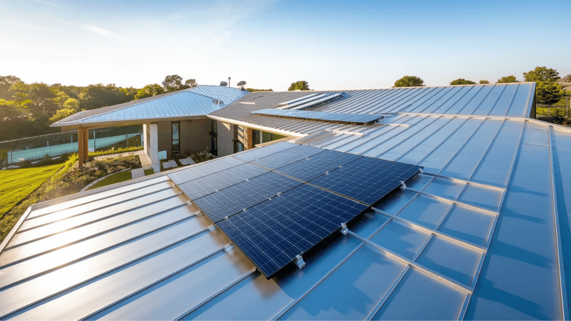 energy-efficient metal roof with solar panels installed on a modern home designed to reduce energy use and improve sustainability
