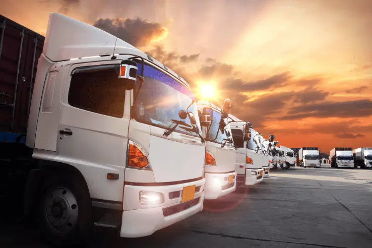 Container trucks in a logistics company parking lot