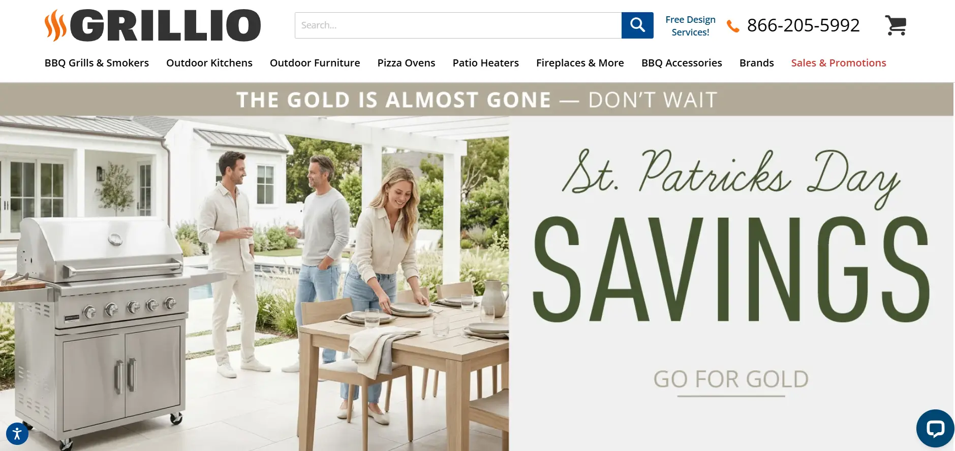 Outdoor patio with stainless steel grill, people socializing, and table set with plates and glasses