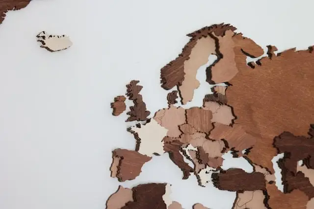 Wooden cutout map of Northern Europe and Iceland on a white background