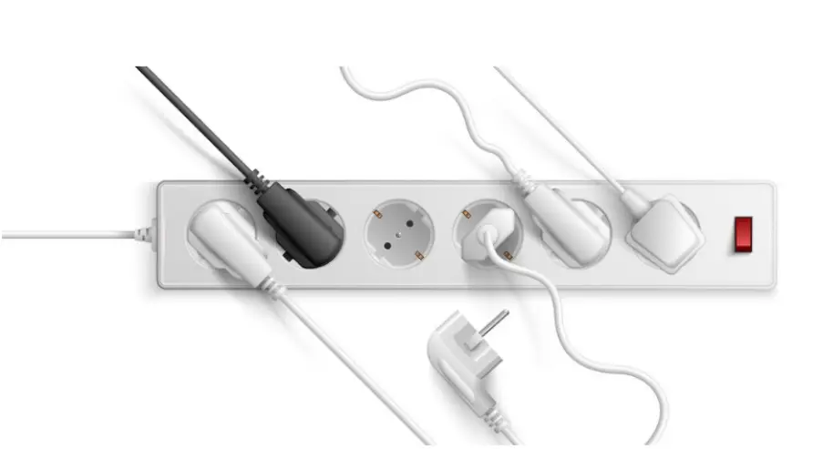 Power strip with multiple plugs connected on white background with red switch