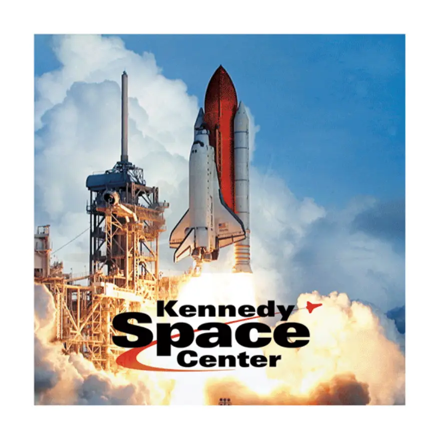 Space shuttle launching against cloudy sky with visible launch pad and fiery exhaust plumes