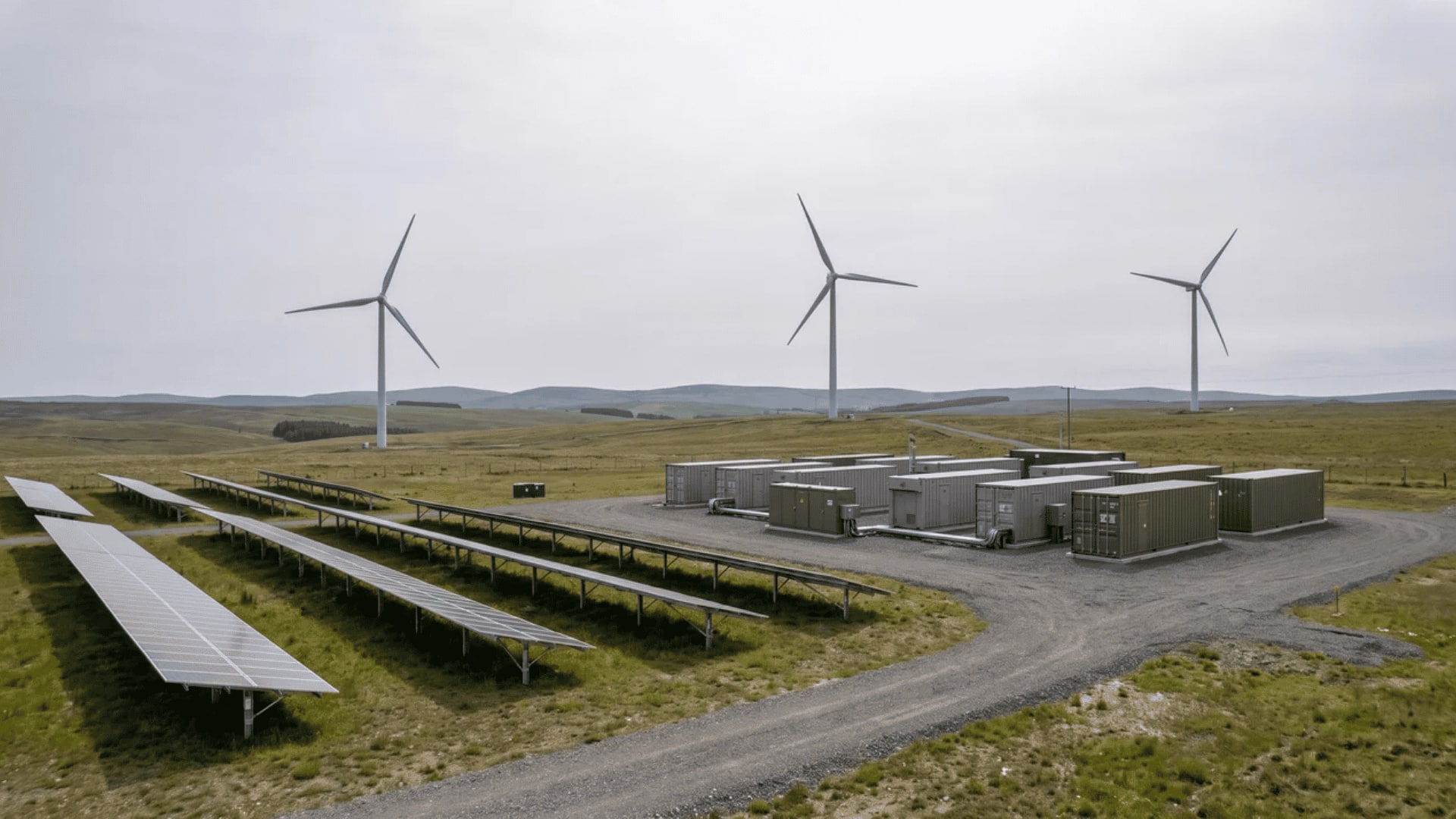 Solar panels, wind turbines, and energy storage units in a renewable energy site