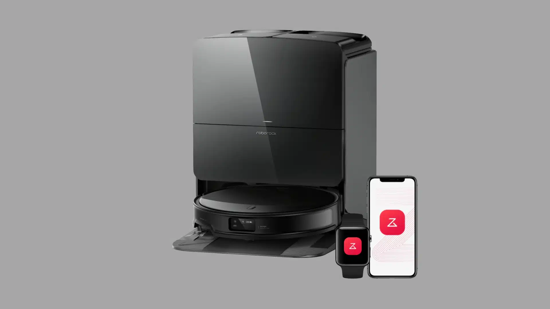 Black Roborock robot vacuum in a self-cleaning dock beside smartphone and smartwatch app displays.