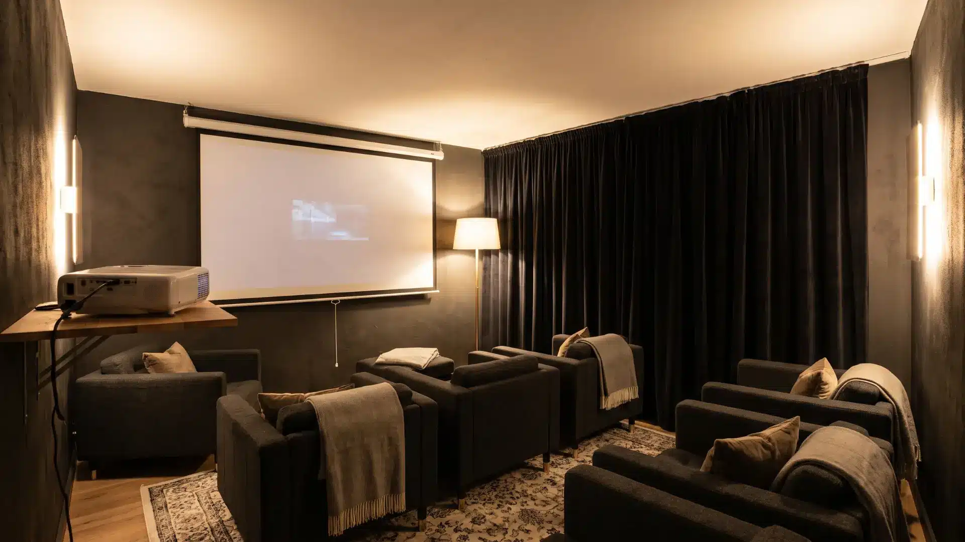 Basement cinema corner with projector and pull-down screen