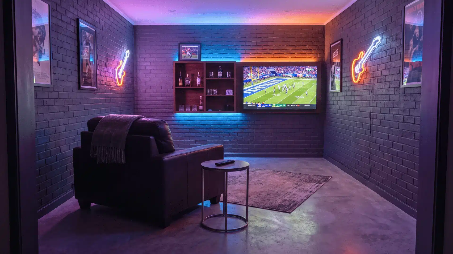 Small man cave with one main seat, wall-mounted TV, compact bar shelf, and clear floor space.