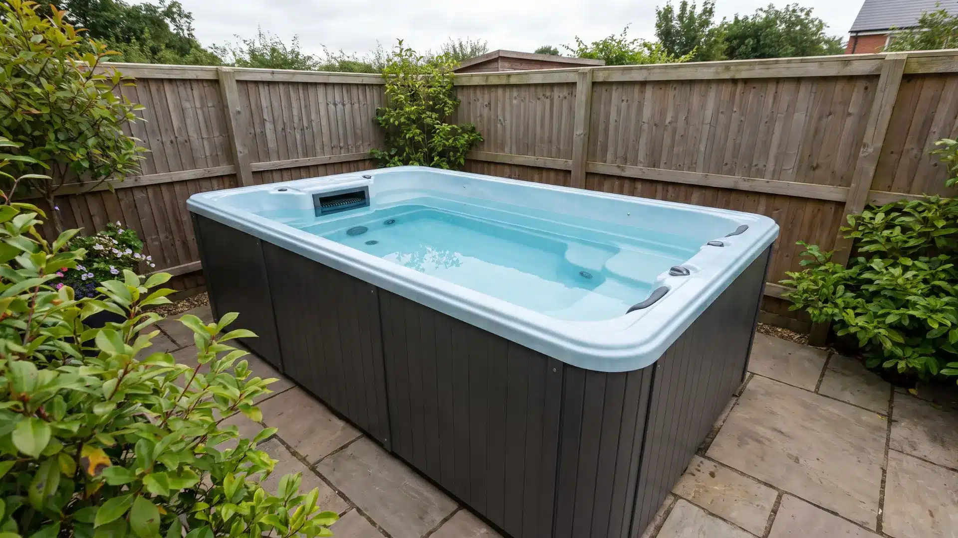 Compact swim spa installed in a backyard space