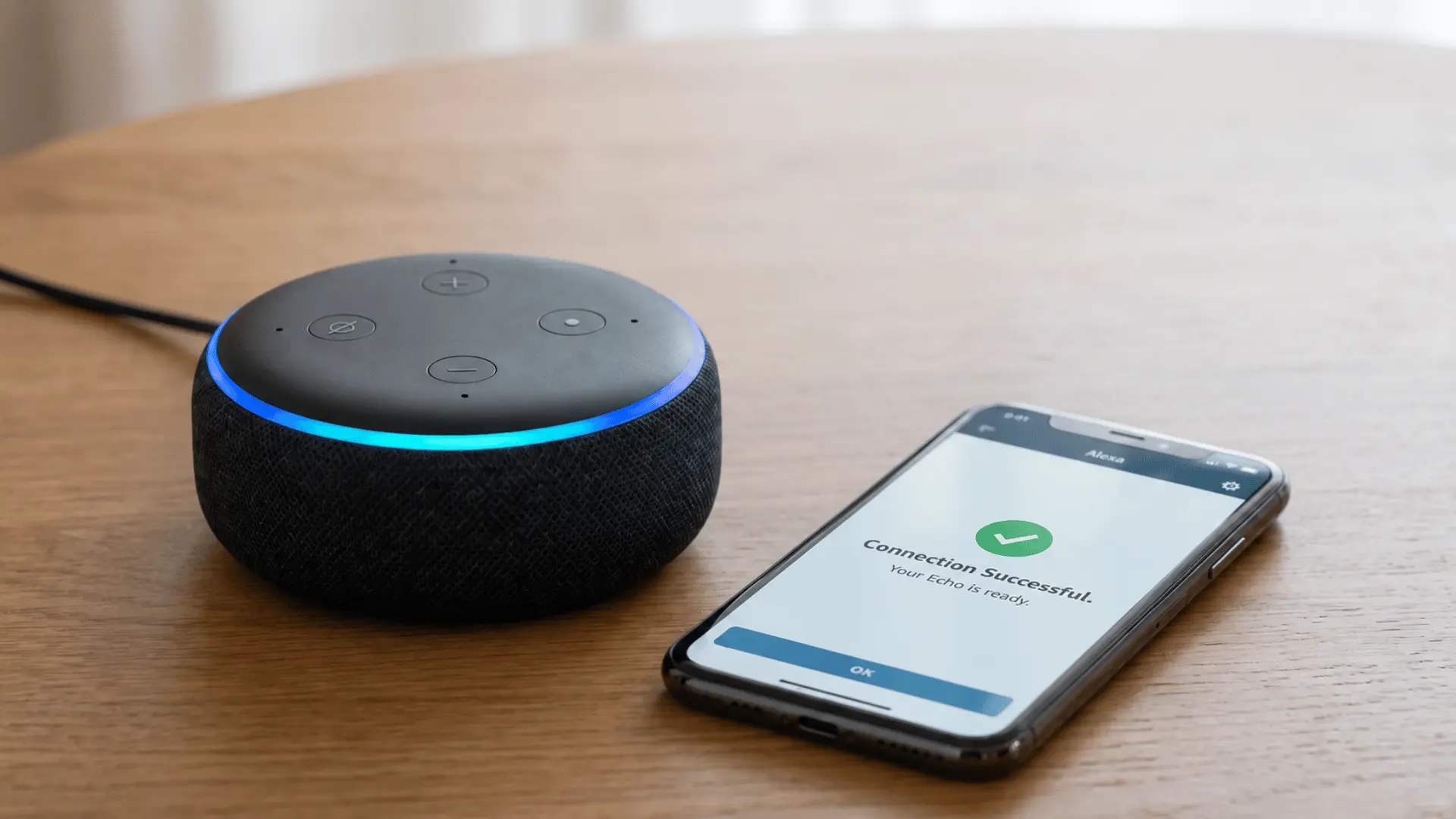 Echo speaker beside a smartphone displaying a successful Alexa Wi-Fi connection confirmation