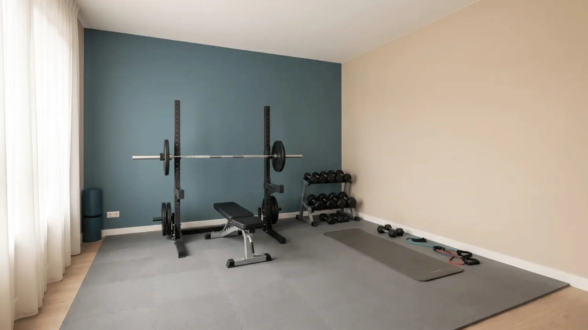 Home gym with an accent wall behind equipment