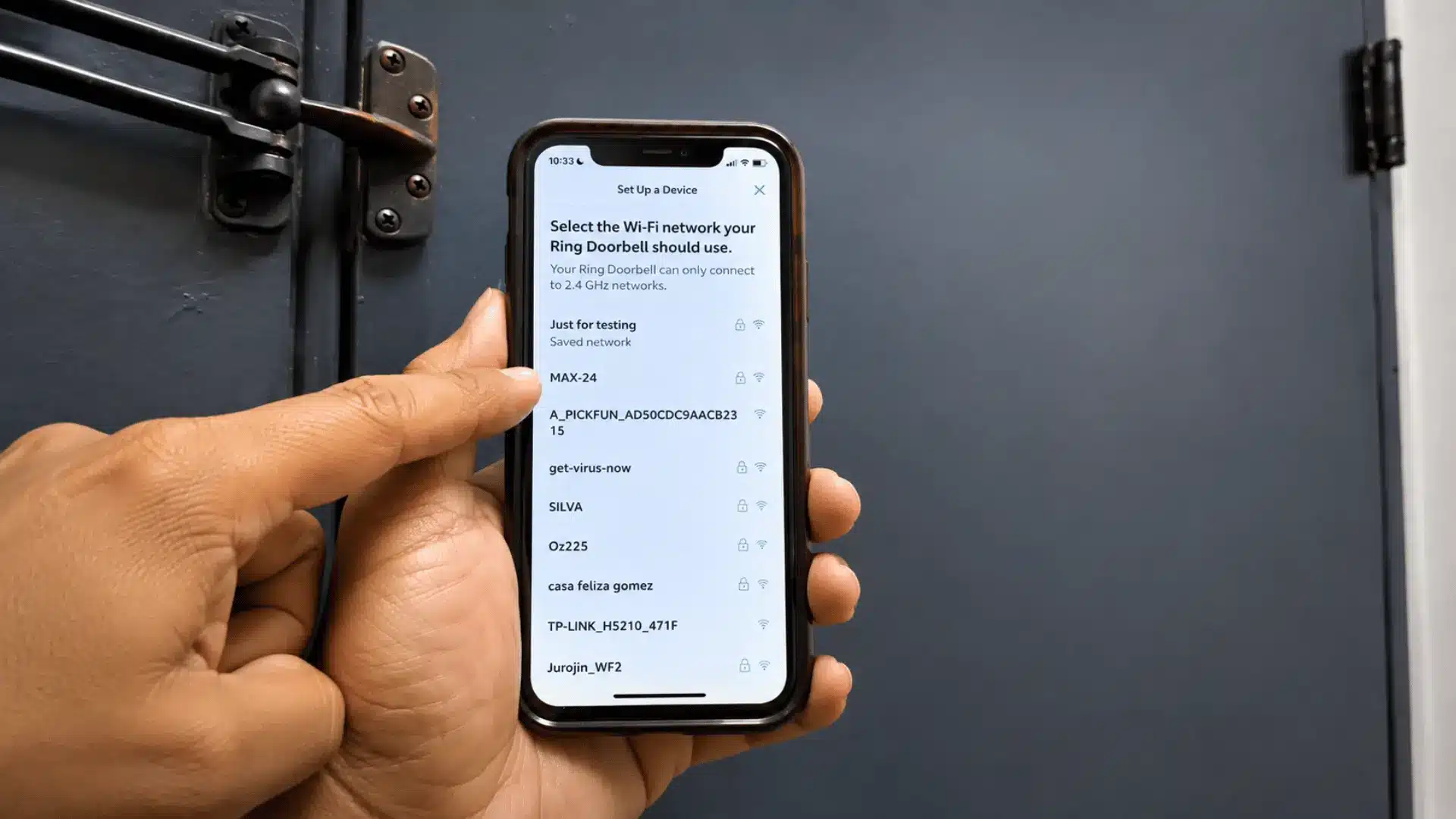 Ring setup screen displaying available Wi-Fi networks to connect a doorbell to a new network.  File name: