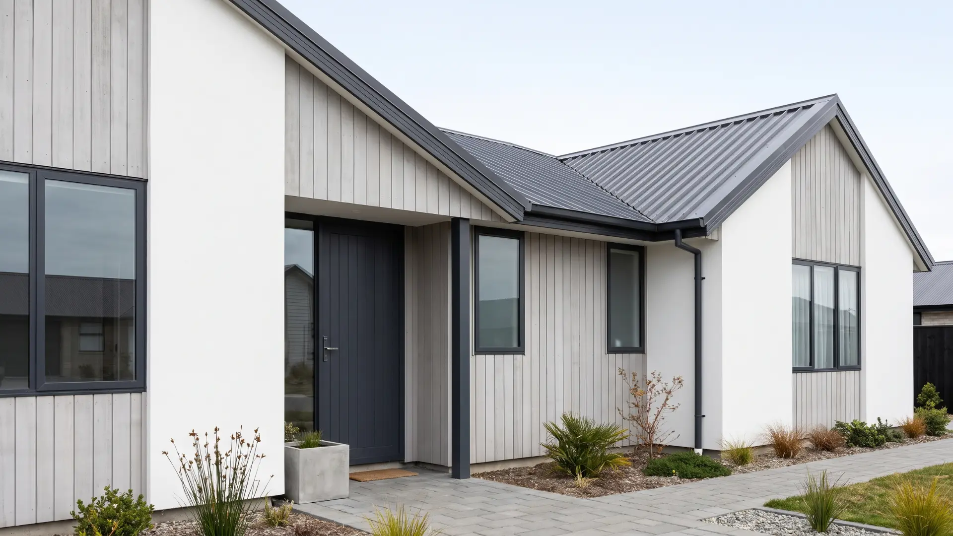 Scandinavian exterior with white gray and charcoal colors