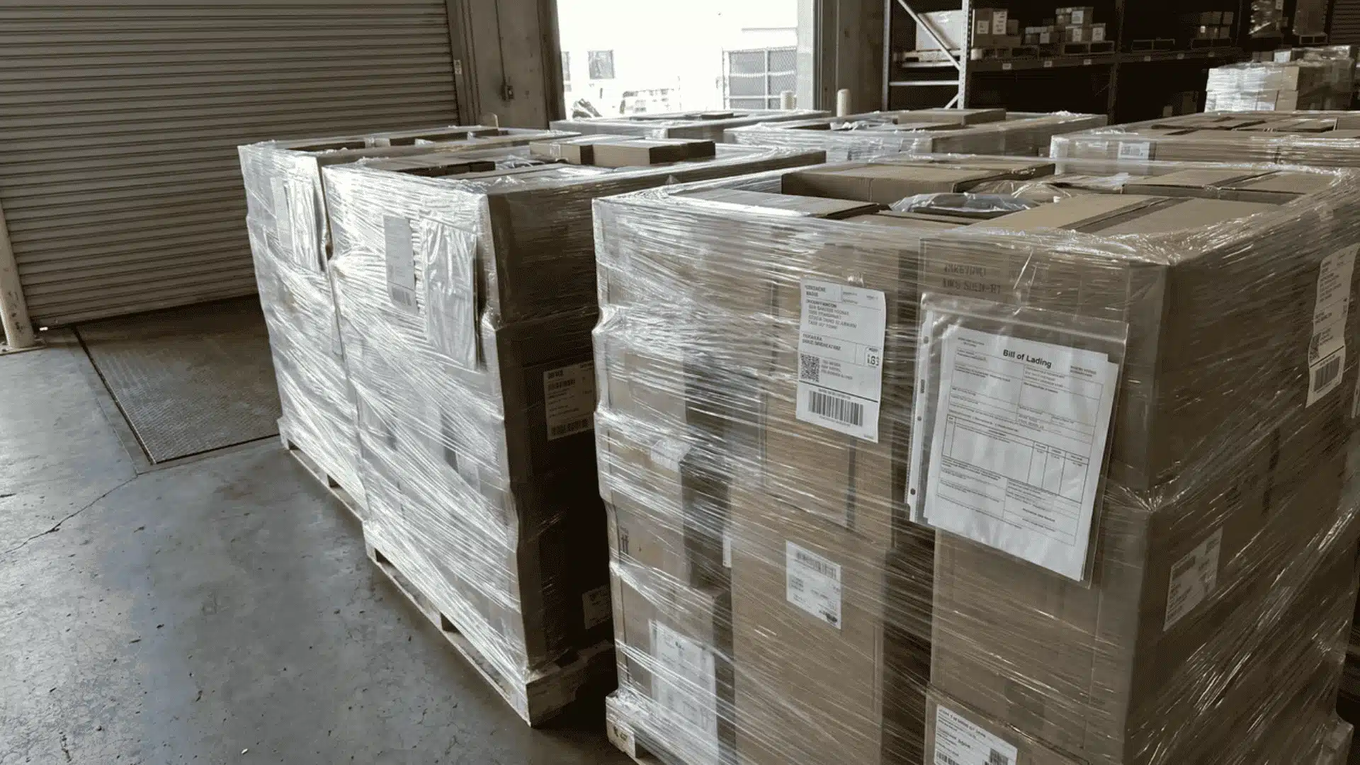 Palletized and labeled LTL freight with Bill of Lading ready for carrier pickup.