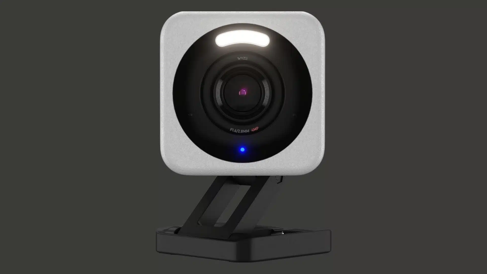 White Wyze security camera with a square design, black lens, status light, and adjustable tabletop stand.